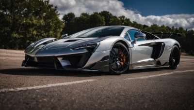 outdoors,sky,day,cloud,tree,blue sky,no humans,shadow,cloudy sky,ground vehicle,motor vehicle,car,road,vehicle focus,wheel,sports car,solo