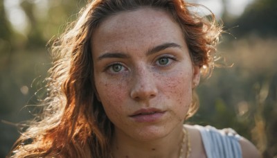 1girl,solo,long hair,looking at viewer,brown hair,brown eyes,jewelry,green eyes,earrings,outdoors,parted lips,necklace,mole,blurry,lips,depth of field,blurry background,messy hair,portrait,mole under mouth,close-up,freckles,realistic,nose,mole on cheek,hair ornament,teeth,eyelashes,sunlight,wind,backlighting,dirty,bokeh