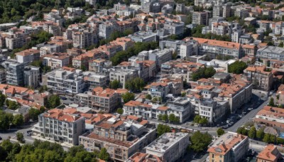 outdoors,tree,no humans,from above,building,scenery,city,road,cityscape,river,rooftop,day,water,ground vehicle,nature,motor vehicle,forest,car,watercraft,bridge,real world location