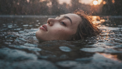 1girl, solo, short hair, blue eyes, brown hair, parted lips, water, blurry, lips, wet, depth of field, partially submerged, freckles, rain, realistic, nose, wet hair