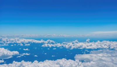 monochrome,outdoors,sky,day,cloud,water,blue sky,no humans,bird,ocean,cloudy sky,scenery,blue theme,horizon,landscape,above clouds