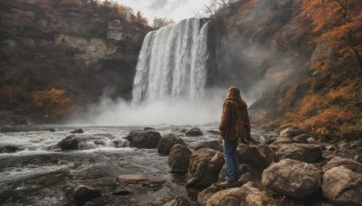 solo,brown hair,long sleeves,1boy,standing,jacket,male focus,outdoors,pants,hood,water,bag,from behind,tree,backpack,denim,nature,scenery,forest,brown jacket,jeans,rock,mountain,blue pants,wide shot,river,waterfall,fog,cliff,stream,ambiguous gender