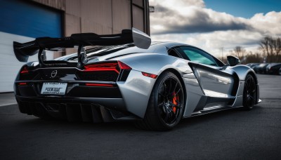 outdoors,sky,day,cloud,tree,blue sky,no humans,ground vehicle,motor vehicle,car,road,vehicle focus,wheel,sports car,solo,red eyes