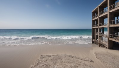 outdoors,sky,day,water,blue sky,no humans,ocean,beach,building,scenery,sand,horizon,waves,shore,cloud,window