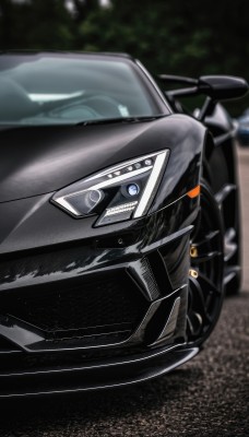 solo,outdoors,blurry,no humans,blurry background,ground vehicle,motor vehicle,realistic,car,vehicle focus,photo background,sports car,blue eyes,wheel