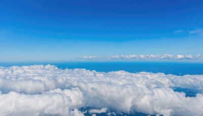 monochrome,outdoors,sky,day,cloud,water,blue sky,no humans,ocean,cloudy sky,scenery,blue theme,city,horizon,cityscape,landscape,above clouds