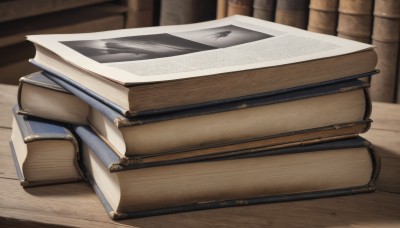 indoors,blurry,book,no humans,blurry background,table,wooden floor,paper,open book,realistic,book stack,still life,wooden table,wood,shiny,signature,shadow,scenery