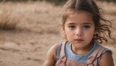 1girl,solo,looking at viewer,brown hair,dress,brown eyes,closed mouth,upper body,sleeveless,blurry,lips,blurry background,wind,child,realistic,nose,female child,short hair,shirt,bare shoulders,outdoors,parted lips,floating hair,messy hair,portrait,close-up,forehead,overalls,dirty,dust