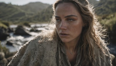 1girl,solo,long hair,blonde hair,brown hair,jewelry,upper body,outdoors,parted lips,day,necklace,blurry,lips,looking to the side,grey eyes,depth of field,blurry background,looking away,portrait,freckles,realistic,river,brown eyes,sunlight,nature,mountain,looking afar,dirty,mole on cheek