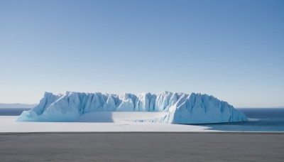 outdoors,sky,day,water,blue sky,no humans,shadow,ocean,beach,scenery,snow,ice,mountain,sand,horizon,road,landscape,mountainous horizon,shore,desert,monochrome,blue theme