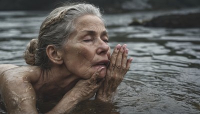 1girl,solo,short hair,1boy,closed eyes,upper body,grey hair,male focus,nude,outdoors,water,blurry,lips,fingernails,wet,blurry background,half-closed eyes,own hands together,partially submerged,realistic,nose,wet hair,old,old man,old woman,wrinkled skin,blonde hair,closed mouth,hair bun,scar,single hair bun,portrait,praying