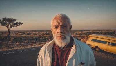 solo,looking at viewer,shirt,1boy,closed mouth,jacket,upper body,white hair,grey hair,male focus,outdoors,sky,tree,facial hair,scar,ground vehicle,motor vehicle,beard,scar on face,realistic,mustache,car,old,old man,photo background,wrinkled skin,closed eyes,scarf,night,ocean,beach,white jacket,red shirt,star (sky),scenery,facing viewer,sunset,scar across eye,horizon