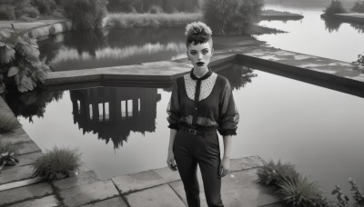 1girl,solo,looking at viewer,short hair,shirt,standing,monochrome,flower,greyscale,outdoors,belt,pants,water,tree,grass,plant,scenery,sleeves rolled up,realistic,arms at sides,very short hair,bridge,freckles