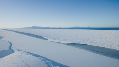 monochrome,outdoors,sky,day,cloud,water,blue sky,no humans,shadow,ocean,beach,scenery,blue theme,sand,horizon,road,shore,tree,snow,mountain,landscape,mountainous horizon