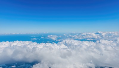 monochrome,outdoors,sky,day,cloud,blue sky,no humans,ocean,nature,scenery,blue theme,city,horizon,cityscape,landscape,above clouds,water,cloudy sky