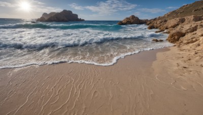 outdoors,sky,day,cloud,water,blue sky,no humans,ocean,beach,cloudy sky,scenery,rock,sand,sun,horizon,waves,shore,sunlight