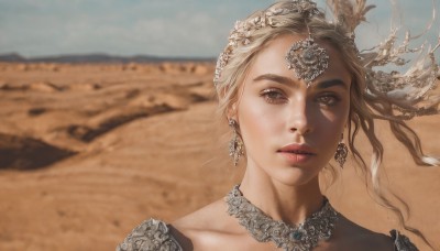 1girl,solo,long hair,looking at viewer,blonde hair,brown hair,hair ornament,brown eyes,jewelry,collarbone,earrings,outdoors,parted lips,sky,choker,day,necklace,blurry,lips,blurry background,feathers,gem,portrait,freckles,circlet,realistic,sand,desert,dress,mole,heterochromia,thick eyebrows,mole on cheek