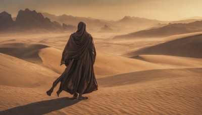 solo,1boy,standing,male focus,outdoors,hood,from behind,cape,shadow,scenery,cloak,hood up,walking,mountain,sand,hooded cloak,sepia,ambiguous gender,brown theme,desert,holding,monochrome,weapon,sword,beach,facing away,landscape