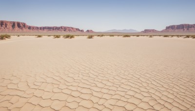 outdoors,sky,day,tree,blue sky,no humans,grass,building,scenery,mountain,sand,road,landscape,mountainous horizon,path,desert,water,beach,nature,shore,hill