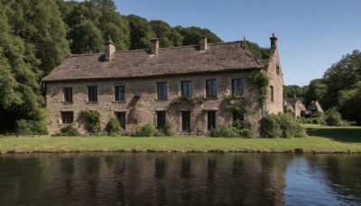 outdoors,sky,day,water,tree,blue sky,no humans,window,grass,building,nature,scenery,forest,reflection,ruins,house,river,reflective water,plant,door,bush,lake