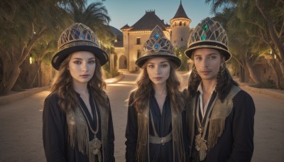 long hair,looking at viewer,smile,multiple girls,brown hair,black hair,hat,brown eyes,jewelry,closed mouth,upper body,earrings,outdoors,sky,day,3girls,necklace,tree,blue sky,lips,siblings,wavy hair,crown,sisters,building,curly hair,realistic,palm tree,road,fringe trim,desert,mole,night,scenery,fantasy,castle