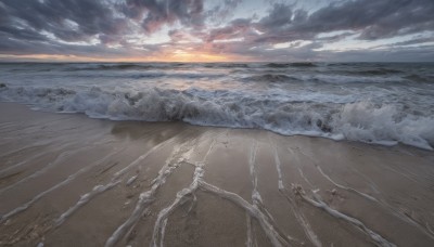 outdoors,sky,cloud,water,no humans,ocean,beach,sunlight,cloudy sky,scenery,sunset,sand,sun,horizon,waves,shore,footprints