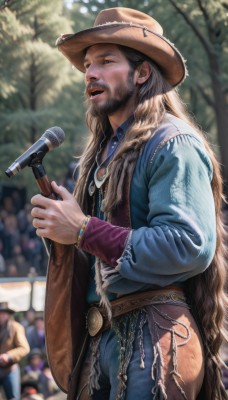 solo,long hair,open mouth,blue eyes,brown hair,shirt,black hair,long sleeves,1boy,hat,holding,jewelry,very long hair,standing,male focus,cowboy shot,outdoors,multiple boys,teeth,solo focus,day,belt,pants,necklace,blurry,bracelet,from side,tree,blurry background,facial hair,upper teeth only,blue shirt,denim,microphone,beard,jeans,realistic,nose,mustache,music,brown headwear,blue pants,holding microphone,singing,cowboy hat,crowd,jacket,vest,depth of field,blue jacket,microphone stand,denim jacket