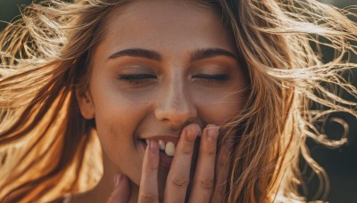 1girl,solo,long hair,smile,open mouth,blonde hair,simple background,closed eyes,teeth,blurry,lips,fingernails,eyelashes,floating hair,portrait,facing viewer,close-up,realistic,nose,covering mouth,hand to own mouth,laughing,brown hair