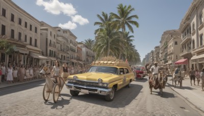 multiple girls,outdoors,multiple boys,sky,day,cloud,tree,blue sky,shadow,ground vehicle,building,scenery,motor vehicle,6+boys,city,palm tree,car,road,vehicle focus,street,crowd,truck,people,no humans,bicycle,crosswalk,real world location