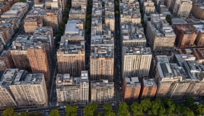 outdoors,tree,no humans,from above,building,scenery,city,road,cityscape,skyscraper,real world location,day,ground vehicle,motor vehicle