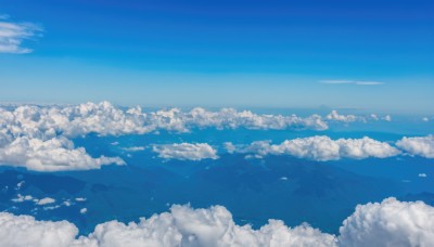 monochrome,outdoors,sky,day,cloud,blue sky,no humans,bird,ocean,cloudy sky,scenery,blue theme,mountain,horizon,landscape,above clouds