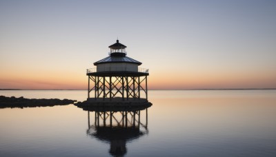 outdoors,sky,cloud,water,no humans,ocean,building,scenery,reflection,sunset,horizon,architecture,gradient sky,reflective water,twilight,evening,lake,orange sky,sunrise