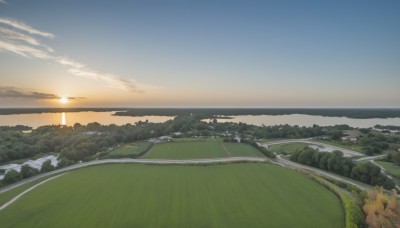 outdoors,sky,day,cloud,water,tree,blue sky,no humans,ocean,beach,sunlight,grass,building,nature,scenery,forest,sunset,mountain,sun,horizon,road,field,river,landscape,mountainous horizon,shore,hill,cloudy sky,city,path,sunrise