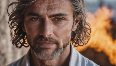 solo,looking at viewer,short hair,brown hair,shirt,black hair,1boy,brown eyes,closed mouth,white shirt,male focus,outdoors,blurry,blurry background,facial hair,scar,thick eyebrows,portrait,beard,curly hair,realistic,mustache,lips,close-up,stubble