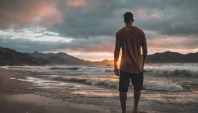 solo,short hair,shirt,black hair,1boy,standing,short sleeves,male focus,outdoors,sky,shorts,barefoot,cloud,water,from behind,ocean,beach,black shorts,cloudy sky,t-shirt,scenery,sunset,mountain,sand,facing away,mountainous horizon,shore,hat,rock,waves