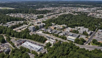 outdoors,sky,day,water,tree,no humans,from above,building,nature,scenery,forest,city,cityscape,river,landscape,ocean,ground vehicle,motor vehicle,mountain,aircraft,military vehicle,car,road,watercraft,vehicle focus,ship,shore,real world location