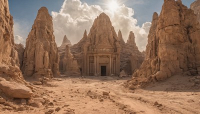 outdoors,sky,day,cloud,blue sky,no humans,sunlight,cloudy sky,building,scenery,rock,sand,sun,ruins,desert,stone,rubble,mountain,pillar,arch