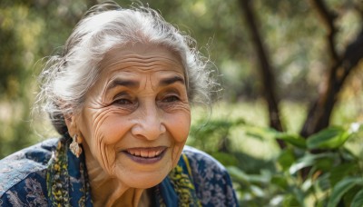 1girl,solo,looking at viewer,smile,dress,brown eyes,jewelry,flower,white hair,earrings,outdoors,teeth,day,hair bun,grin,blurry,lips,depth of field,blurry background,single hair bun,portrait,realistic,old,old man,old woman,wrinkled skin,black eyes,tree,messy hair