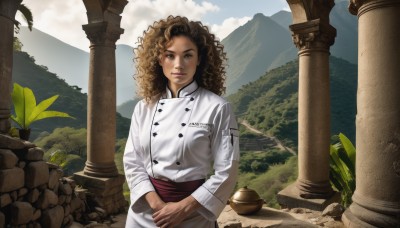 1girl,solo,long hair,looking at viewer,smile,brown hair,long sleeves,brown eyes,closed mouth,upper body,outdoors,sky,day,cloud,dark skin,dark-skinned female,lips,sash,buttons,cloudy sky,own hands together,plant,curly hair,mountain,realistic,pillar,statue,column,standing,tree,parody,scenery,wall,chef