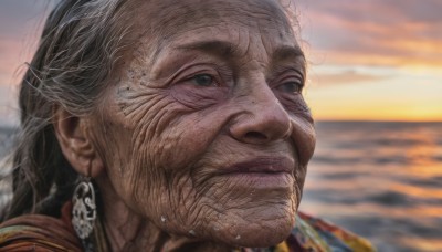 solo,long hair,looking at viewer,black hair,1boy,jewelry,closed mouth,grey hair,male focus,earrings,outdoors,sky,cloud,water,blurry,black eyes,lips,wet,blurry background,ocean,cloudy sky,portrait,close-up,sunset,realistic,old,old man,wrinkled skin,facial hair,looking afar,old woman