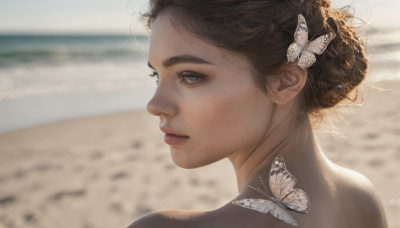 1girl, solo, looking at viewer, short hair, brown hair, hair ornament, bare shoulders, closed mouth, outdoors, day, looking back, hair bun, blurry, lips, grey eyes, eyelashes, blurry background, beach, single hair bun, bug, butterfly, portrait, realistic, nose, sand