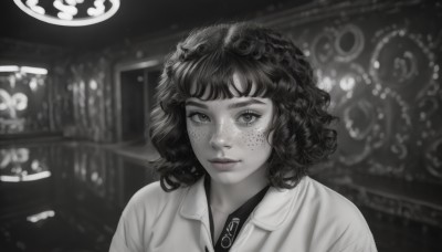 1girl,solo,looking at viewer,short hair,bangs,shirt,closed mouth,monochrome,upper body,greyscale,parted lips,collared shirt,indoors,medium hair,blurry,lips,eyelashes,blurry background,portrait,freckles,spot color,curly hair,realistic,nose,smile,artist name,depth of field,light smile