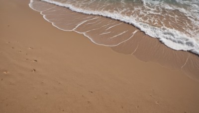 solo,outdoors,day,water,no humans,ocean,beach,scenery,sand,waves,shore,footprints,from above