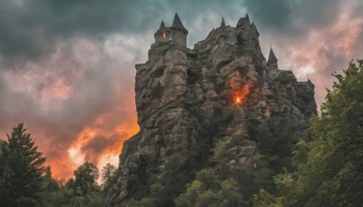 outdoors,sky,day,cloud,tree,no humans,cloudy sky,fire,building,nature,scenery,forest,smoke,mountain,castle,monster