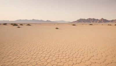 outdoors,sky,day,tree,no humans,beach,nature,scenery,mountain,sand,road,landscape,mountainous horizon,gradient sky,shore,hill,desert,ocean,ground vehicle,rock