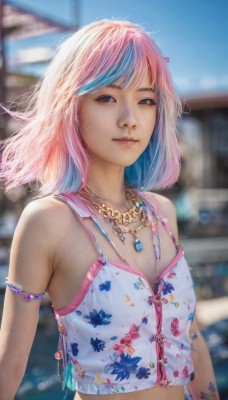 1girl,solo,breasts,looking at viewer,smile,short hair,bangs,bare shoulders,brown eyes,jewelry,closed mouth,blue hair,upper body,pink hair,multicolored hair,small breasts,outdoors,sky,sleeveless,day,midriff,artist name,medium hair,necklace,blurry,black eyes,flat chest,two-tone hair,lips,streaked hair,crop top,tattoo,depth of field,blurry background,floral print,armlet,camisole,realistic,nose,navel,tank top,freckles