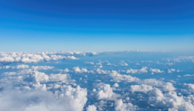 monochrome,outdoors,sky,day,cloud,blue sky,no humans,cloudy sky,scenery,blue theme,horizon,cityscape,landscape,above clouds,ocean