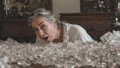 1girl,solo,looking at viewer,open mouth,blue eyes,shirt,1boy,jewelry,white shirt,upper body,flower,white hair,grey hair,male focus,earrings,teeth,indoors,blurry,grey eyes,table,realistic,candle,photo (object),old,old man,old woman,wrinkled skin,smile,horror (theme),candlestand